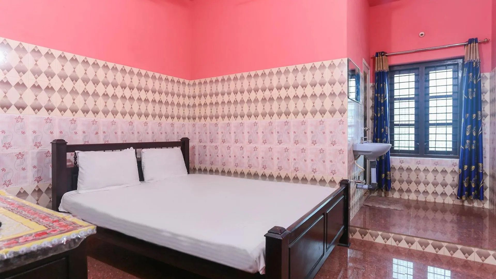 Hotel O Sree Bhadra Tourist Home Kollam