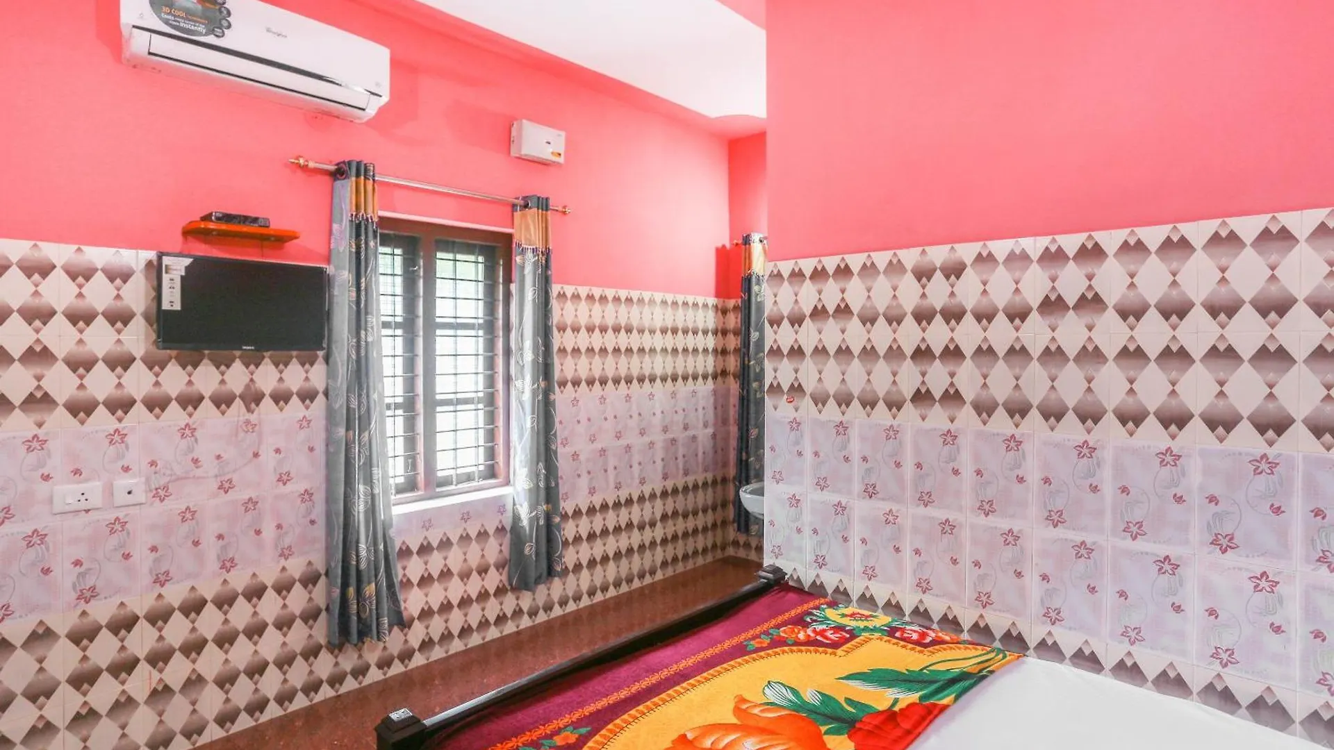 Hotel O Sree Bhadra Tourist Home Kollam